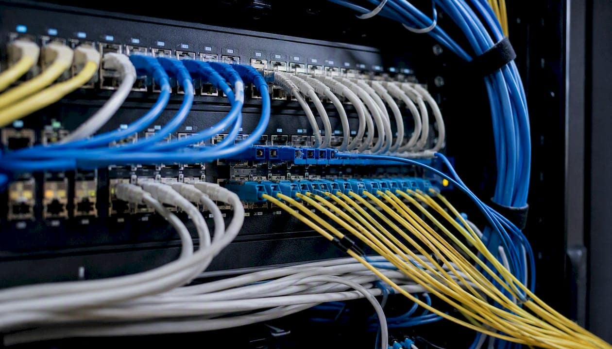 Close-up of patch panel with network cables