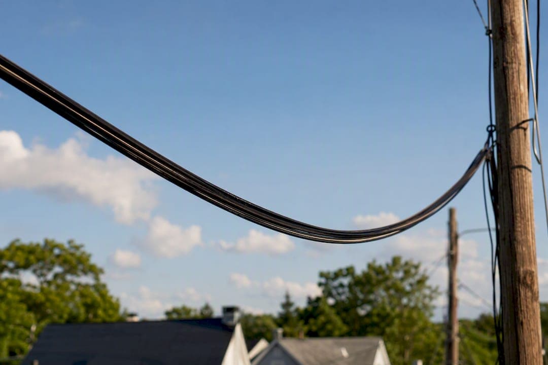 Sagging aerial fiber optic cable outdoors