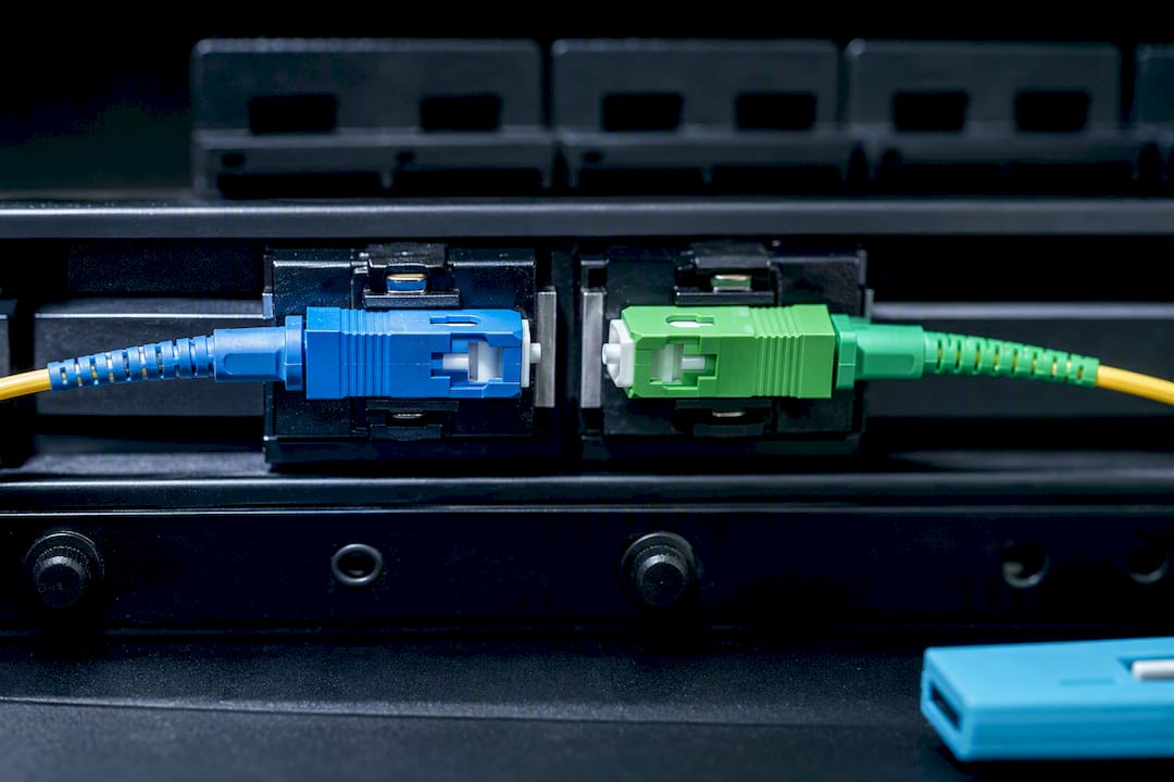 Blue UPC and green APC fiber connectors